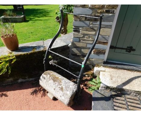 Gardener's Cottage: A granite roller with iron fittings, 23in wide