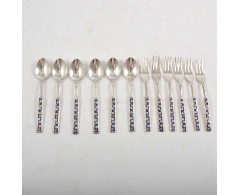 A set of six Japanese white metal spoons and forks, blue enamel and floral decoration to handles, approx. 8oz.