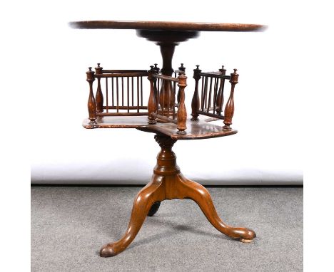 Victorian walnut reading table, circular top above bookrack, tripod splayed legs, diameter 54cm, height 59cm.