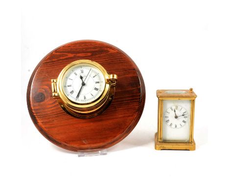 French brass cased carriage clock, white enamelled dial, platform escapement, 12cm; and a modern ship’s type wall clock.