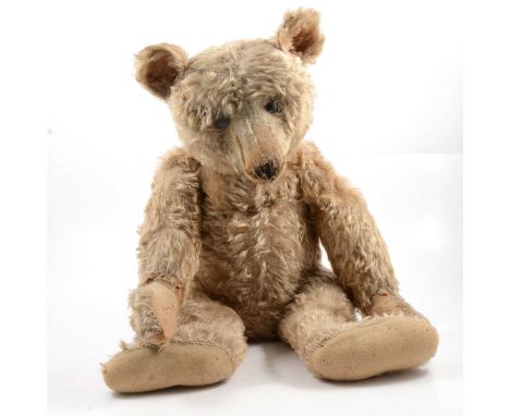 Steiff Teddy bear, early 20th century, with original Steiff button to ear, long mohair fur, straw-filled, jointed limbs, blac