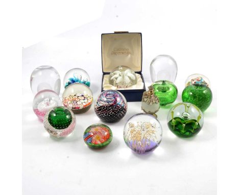 Fourteen Caithness and other paperweights, including a Caithness 'Flamenco' pattern weight, two 'Owl' design weights, two app