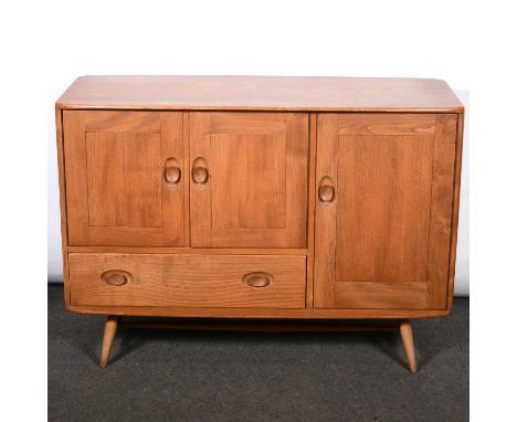 Ercol elm and beech sideboard, rectangular top with rounded corners, fitted with three doors and one drawers, splayed legs, w
