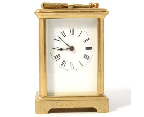 Small French brass carriage clock, rectangular enamelled dial, with Roman numerals, timepiece movement, 12cm.