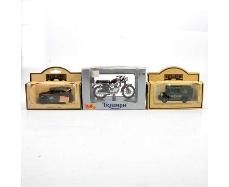 A collection of models and vehicles, including Corgi, Vanguards, Lledo and others, mostly boxed, along with two model display