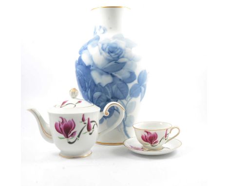 A modern Arita bone china teaset, Magnolia pattern, comprising teapot, plates, cups, saucers, milk jug and sugar bowl; five N