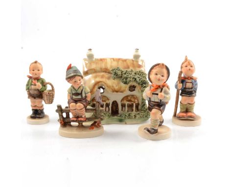 Collection of Hummel figures, approximately thirty six, together with wall pockets and other pottery models of birds.