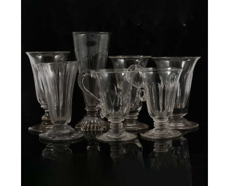 Glass ale flute, conical shape, square lemon squeezer base, 14cm; four other flutes, and a pair of custard cups.