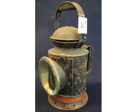 Japanned metal cylindrical shaped railway hand lantern with interchangeable lenses and two handles. Marked Griffiths &amp; So