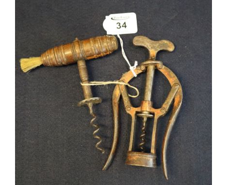 19th Century wooden handled corkscrew with steel helix and hair brush, together with a James Heeley &amp; Sons patented doubl