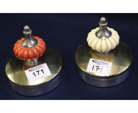 Pair of Christian Dior silver plated trinket or cufflink boxes with fluted coloured finial handles. 10cm diameter approx. (2)