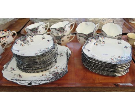 33 piece Shelley bone china tea service, registration no. 723404 on a white ground with enamelled foliate and berry decoratio