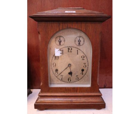 Mid Century oak three train mantel clock or bracket clock with silvered Arabic face. (B.P. 24% incl. VAT)