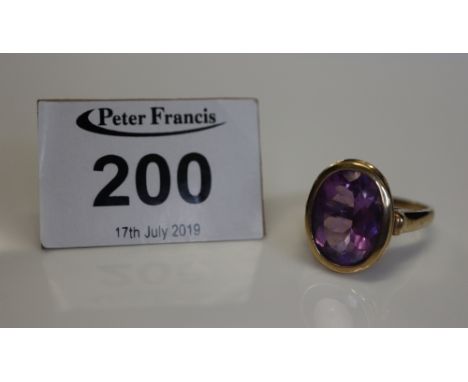 A 9ct gold oval amethyst dress ring. Approx weight 7.5g.(B.P. 24% incl. VAT)