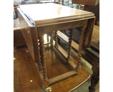 Early 20th Century barley twist gate legged table. (B.P. 24% incl. VAT) CONDITION REPORT: Wear and stains with age. Split thr