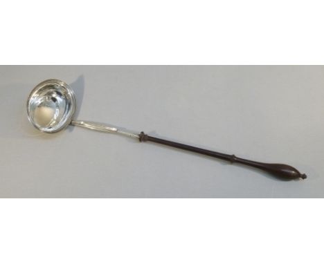 GEORGE III SILVER PUNCH LADLE WITH A REEDED OVAL BOWL AND ENGRAVED MONOGRAM AND TURNED WOOD HANDLE BY IM, LONDON 1801
