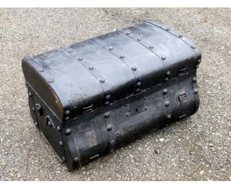 BLACK EMBOSSED LEATHER COVERED TRUNK WITH BRASS STUDS ENCLOSING DECORATIVE CLOTH COVERED COMPARTMENTS (42 cm x 71 cm x 45 cm)