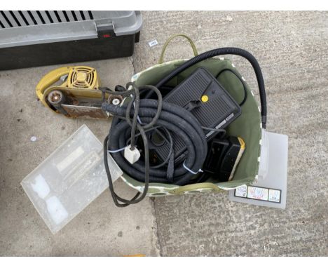 AN ELECTRIC WALL PAPER STRIPPER AND AN ELECTRIC SANDER 