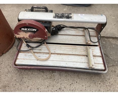 A REXON ELECTRIC TILE CUTTER 