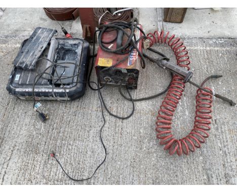 A SEALEY ARC WELDER, AN ELECTRIC TILE CUTTER AND A COMPRESSOR AIRLINE ETC 