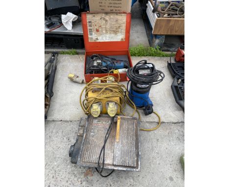 AN ASSORTMENT OF TOOLS TO INCLUDE A 110V TRANSFORMER, A SUBMERSIBLE PUMP AND A BOSCH ELECTRIC JIGSAW ETC 