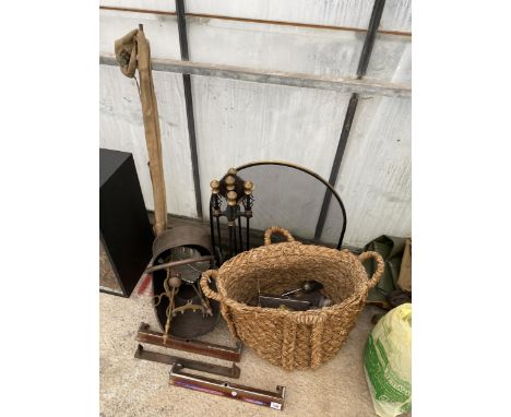 AN ASSORTMENT OF FIRESIDE ITEMS TO INCLUDE A WICKER LOG BASKET, A FIRE SCREEN, A COPPER COAL BUCKET AND A COMPANION SET ETC 