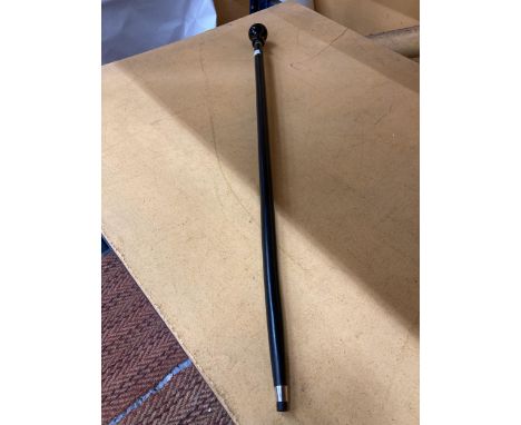 A WALKING STICK WITH A JAGUAR HANDLE 