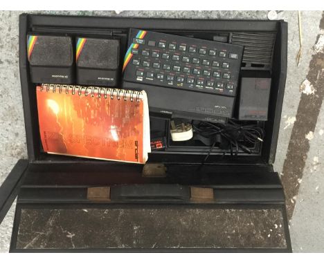 A VINTAGE SINCLAIR ZX SPECTRUM WITH MICRODRIVE, POWER SUPPLY, MICROFACE 1, INSTRUCTION BOOK AND POWER CABLES, IN ORIGINAL CAS