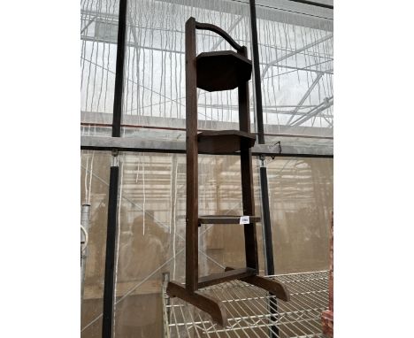 A VINTAGE OAK THREE TIER FOLDING PLANT STAND 