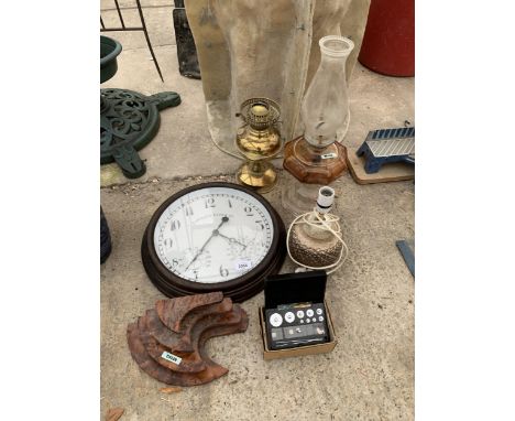 AN ASSORTMENT OF ITEMS TO INCLUDE A WALL CLOCK, OIL LAMPS AND WEIGHTS ETC 
