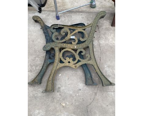 A PAIR OF DECORATIVE CAST IRON BENCH ENDS 