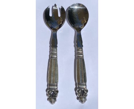 AN ART DECO GEORG JENSEN STERLING SILVER TWO PIECE SALAD SERVER SET IN THE ACORN PATTERN - COMPRISING FORK AND SPOON, BOTH ST