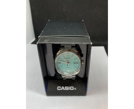 A CASIO CALENDAR WRIST WATCH IN A PRESENTATION BOX SEEN WORKING BUT NO WARRANTY 