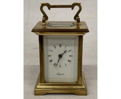 A VINTAGE ANGELUS FRENCH BRASS CASED CARRIAGE CLOCK 