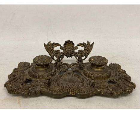 A VINTAGE, POSSIBLY FRENCH, FLORAL DESIGN BRASS DOUBLE INKWELL STAND 