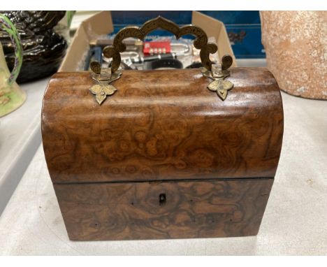 A VINTAGE WALNUT DOMED JEWELLERY BOX WITH BRASS HANDLE 