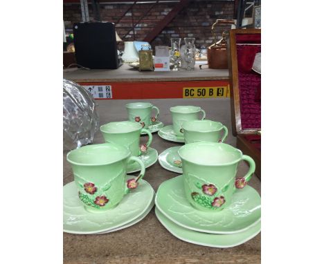 SIX CARLTON WARE LEAF PATTERN CUPS AND SAUCERS 