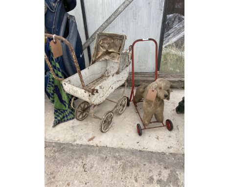A VINTAGE DOLLS PRAM AND A PUSH ALONG DOG 