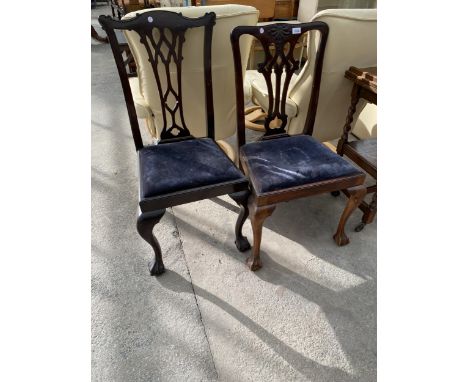 TWO SIMILAR MAHOGANY CHIPPENDALE STYLE DINING CHAIRS ON BALL AND CLAW FEET 