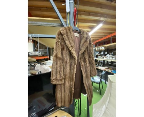 A VINTAGE 'BROWNS OF CHESTER' FUR COAT 
