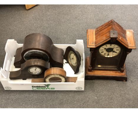 A pine cased mantel clock, an oak mantel clock and three other examples (5)