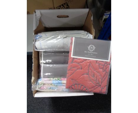 A box of new bedding including linen bed spread, quilt, throw etc 