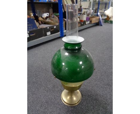 A brass Aladdin oil lamp with chimney and green glass shade 