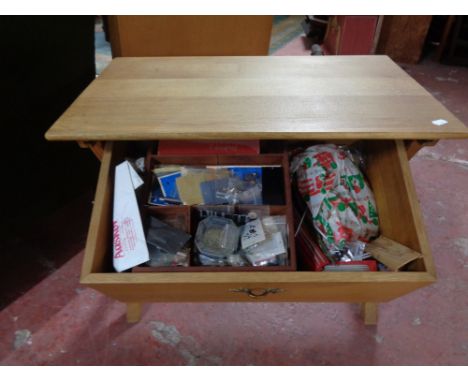 A light oak storage sewing table 