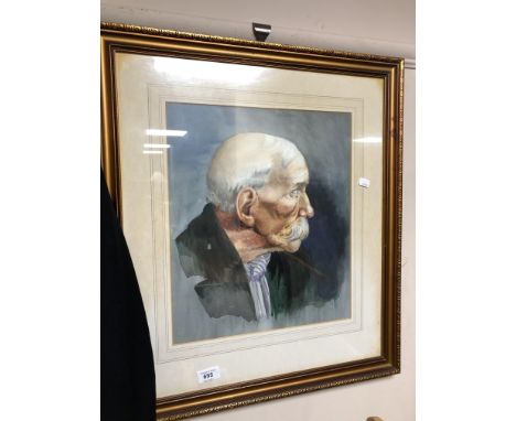 A gilt framed watercolour portrait by J. Harvey