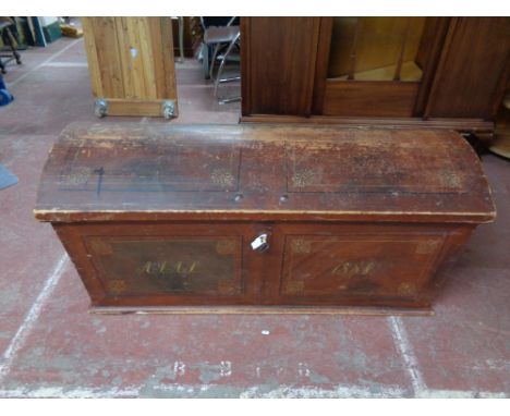 A nineteenth century dome topped trunk with key 