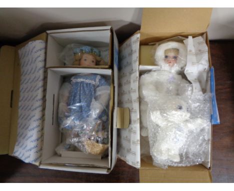 An Ashton Drake Galleries ceramic doll and a Betty P. doll from the Hamilton Collection. 