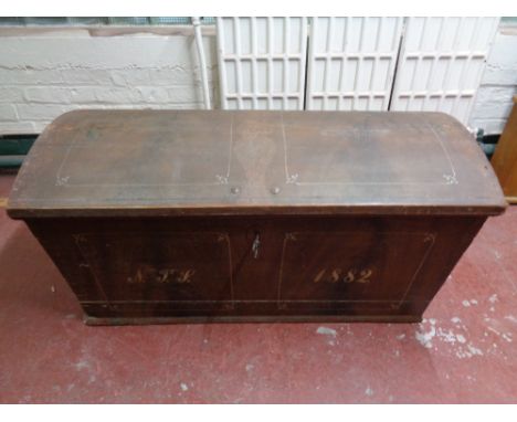 A nineteenth century dome topped trunk with key 