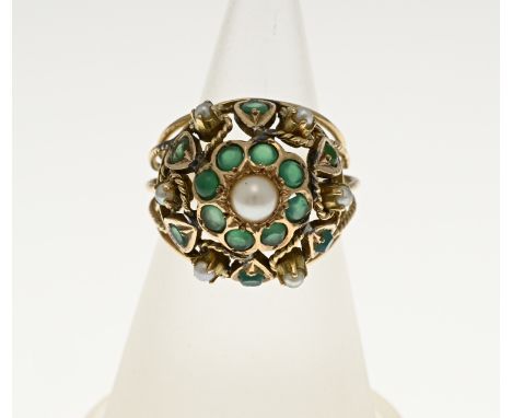 Yellow gold ring, 585/000, with pearls and emerald. Ring with an openworked convex head decorated with a rosette with facette
