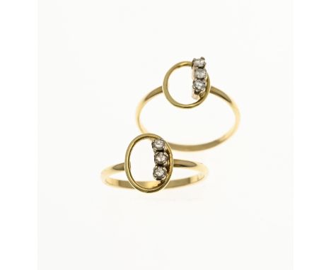 Two yellow gold rings, 585/000, with diamonds. Ring with an oval element with 3 brilliant cut diamonds, total approx. 3x0.02 